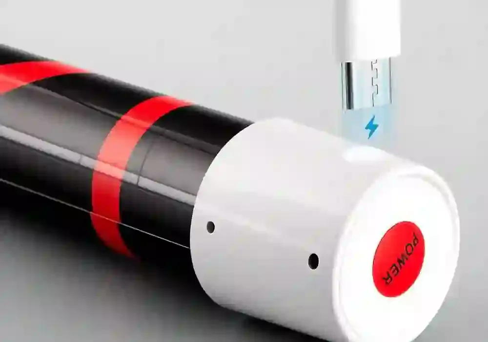 Makro portu ładowania USB-C i przycisku POWER w uchwycie Gibka