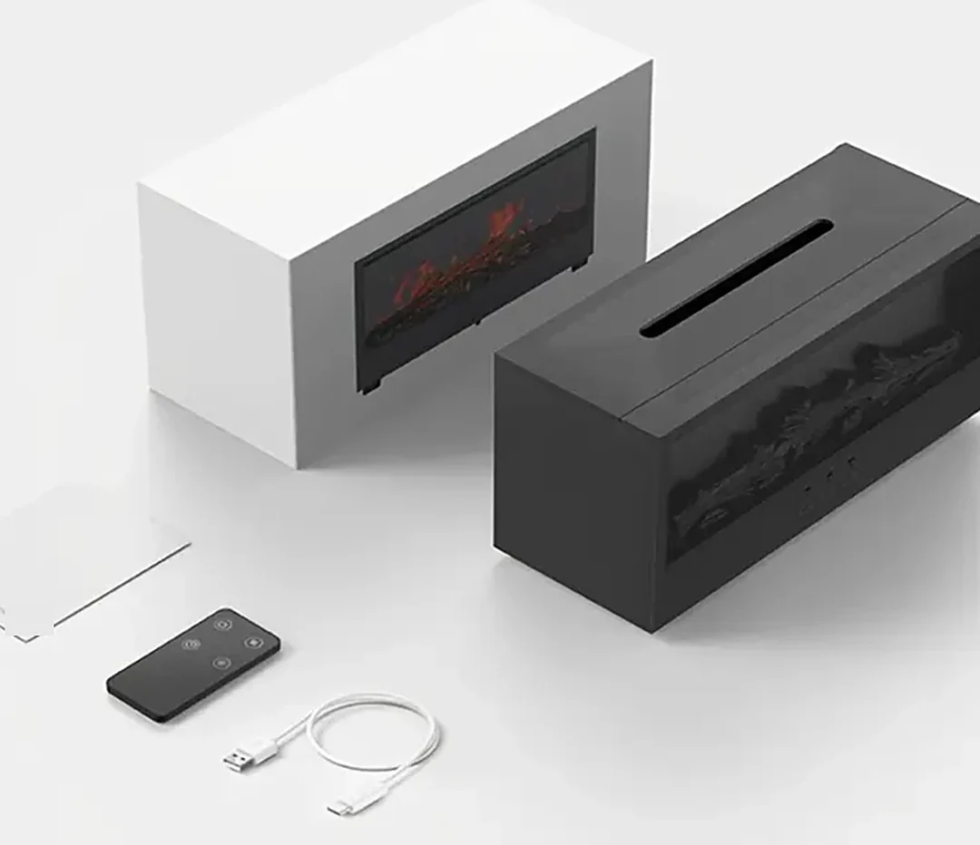 Zestaw na jasnym tle: czarny i biały kominek-nawilżacz obok siebie, pilot, biały kabel USB i instrukcja